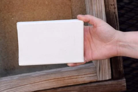 Woman's Hands with Tiny Canvas Stock Photos