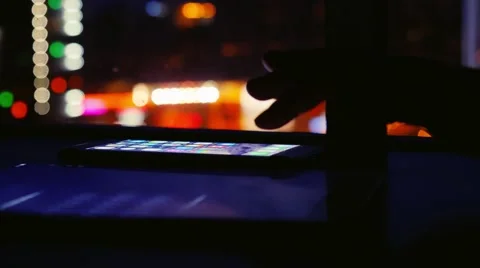 Woman's hands touch screen smart phone, tablet,cellphone on blurred beautiful Stock Footage 60893899