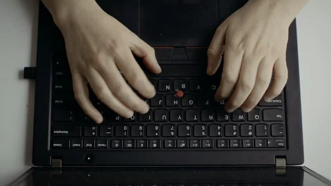 Womans hands type on laptop keyboard Stock Footage 127394565