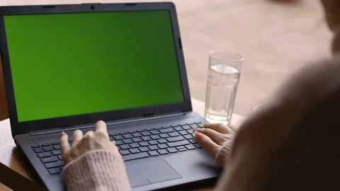 Woman's hands typing on a computer keyboard Stock Footage