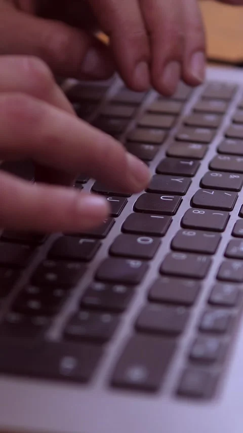 Woman’s hands typing on a laptop during focused work 스톡 동영상 320256349
