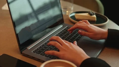 Woman's hands typing on a laptop Stock Footage 171621208