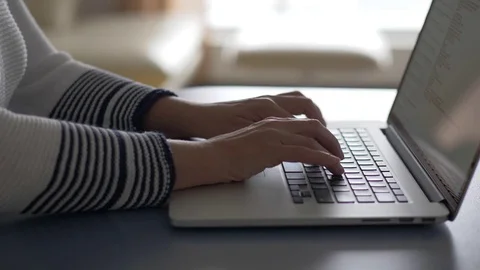 Woman's hands typing laptop keyboard. Close up shot Stock Footage 79355276
