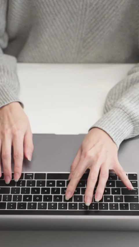 Womans hands typing on laptop keyboard. Work AI prompt Research Social networks Stock Footage 323213075