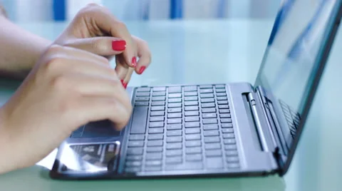 Woman's hands typing on a notebook keyboard: web, internet, searching, computer Stock Footage 42990413