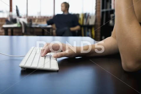A woman's hands typing Stock Photos