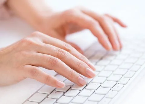Woman's hands typing Stock Photos