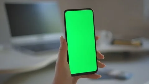 Woman's hands use smartphone with laptop, money dollars, glasses and other Stock Footage 243660988