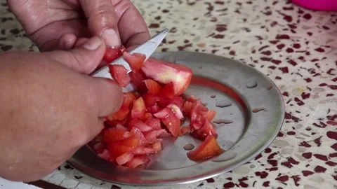 Woman's hands using kitchen knife cutting fresh tomato Stock Footage 163271382