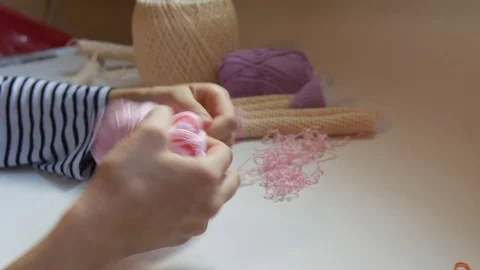 Woman's hands while Doll making Video stock 119036264