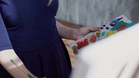 Woman's hands working on pallette Stock Footage 74637512