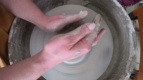 Woman's hands working on potter's wheel. Stock Footage 184822020
