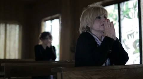 Woman's intense prayer with crossed hands: religion, faith, devotion, Catholics Vídeos de archivo 39375363
