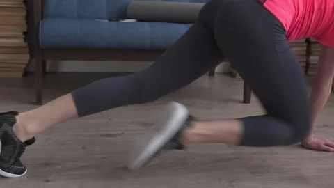 Woman's legs running during an exercise mountain climber on floor at home Stock Footage 87907521
