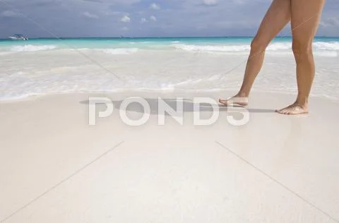 Woman's Legs, Tulum Beach, Quintana Roo, Mexico