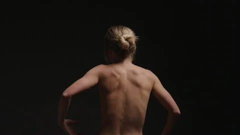 Woman's Muscular Bare Back Flexes as She Dances Stock Footage 208767048