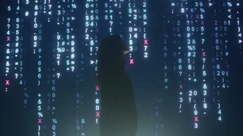 Woman's Outline Stands in Front of Computer Screen and scrolls Binary Code Video stock 219581525