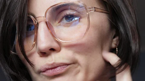Woman's  portrait looking through computer glasses Stock Footage 153737053