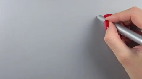 Woman's right hand with red manicure using pen tablet. Top view. Close-up Stock-Footage 84757232