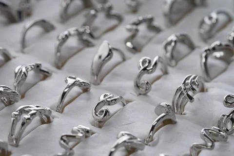 Woman's silver ring collection Stock Photos