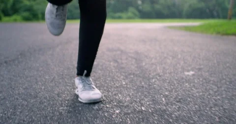 Woman’s sneakers running close-up Stock Footage 77078998