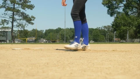 Woman's Softball Practice, Player Dropping and Picking Up Baseball, Low Stock Footage 103718330