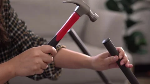 Women adjusting or repair assembling chair Furniture at home diy concept. Video stock 246778290