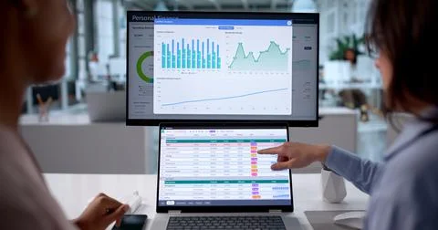 Women Analyze Financial Data Using Spreadsheets And Charts In Hospital. 스톡 사진