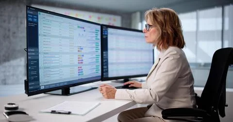 Women Analyzing Data For Medical Coding In Computer Fraud Audit. Stock Photos