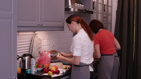 Women are Preparing on Kitchen Stock Footage 64703280
