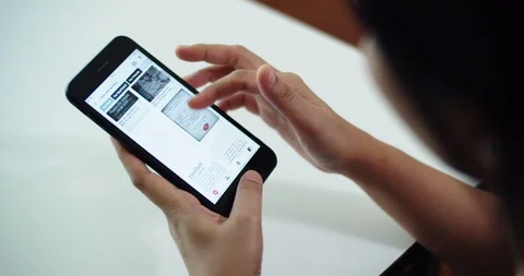 Women are using the phone, scroll through the information quickly. Stock Footage 108502555