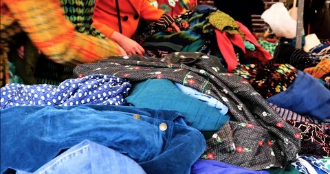 Women browsing for clothes Stock Footage 105650388