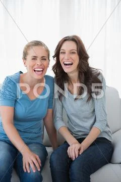 Women bursting out laughing Stock Photos