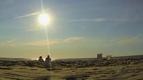 Women in Chairs on a Beach Stock Footage 59553949