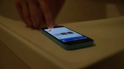 Women checking iPhone in the shower Stock Footage 68089773