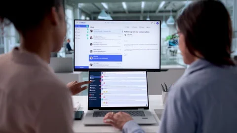 Women Checking Multiple Screens For New Emails 스톡 동영상 328714331