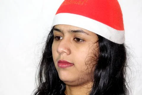 Women with christmas hat expressing Stock Photos