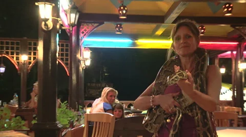 Women dance with a snake. 4K. Stock Footage 40740512