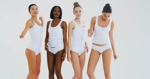 The women of different ethnicities are having fun and smiling in camera. Stock Footage 121558859