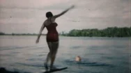 Women Dive Into Water From Diving Board On Dock 1950S Family Home Movie 6015 Stock Footage