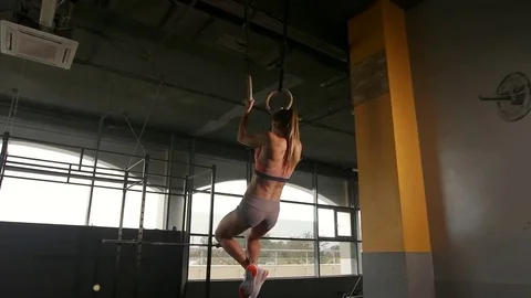 Women doing ring dips and working hard in the box gym Stock-Footage 80920896