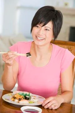 Women eating meal,mealtime with chopsticks Stock Photos