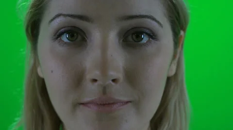 Women facing camera close up against green screen Stock-Footage 24588854