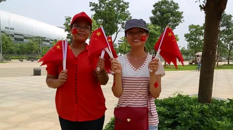 Women With Flags Outside Sporting Event Stock Footage 43345461