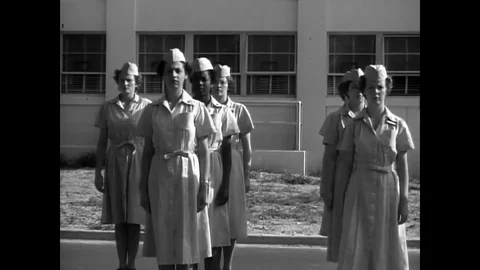 Women in formation at the Women's Army Corps follow instructions and are Stock Footage