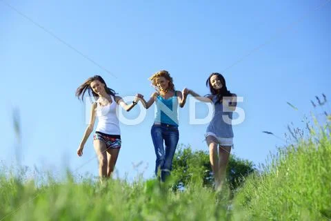 Women grass fun Stock Photos