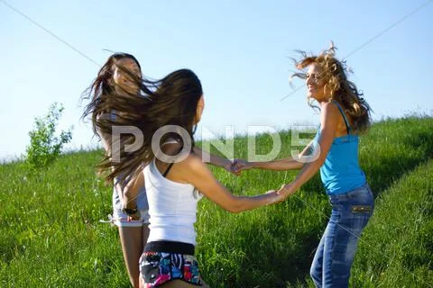 Women grass fun Stock Photos