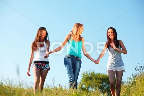 Women grass fun Stock Photos
