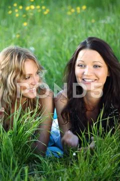 Women grass fun Stock Photos