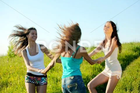 Women grass fun Stock Photos